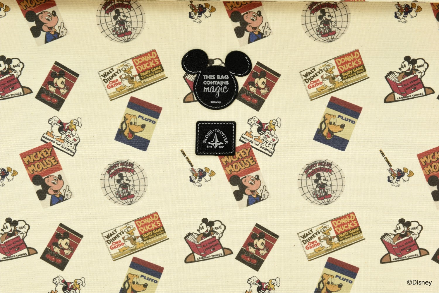 Disney - This Bag Contains Magic Collection · Large Suitcase | Ivory/Black - GLOBE-TROTTER